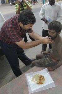 Hungry Destitute getting food